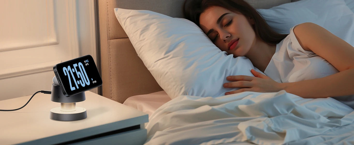 Woman sleeping in bed with an iPhone on Standby mode in 4-in-1-charger.